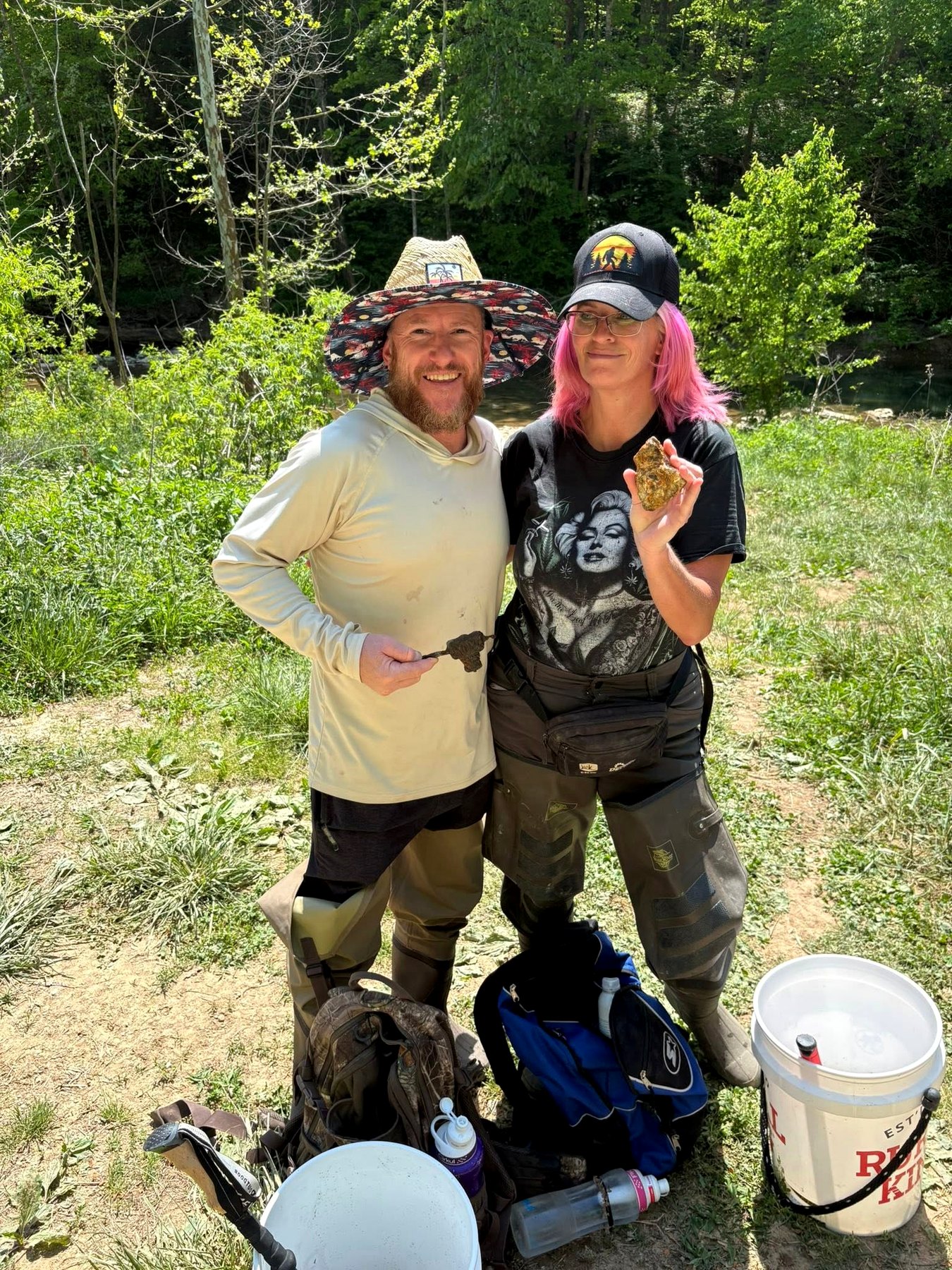 Club members outdoors during a field trip, dressed and equipped for collecting.